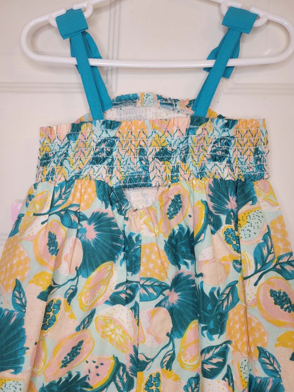 Tommy Bahama Girls Tropical Fruit Smocked Romper in Teal, Yellow & Peach - Picture 9 of 9
